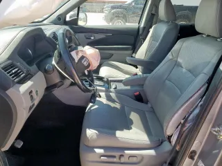2019 Honda Pilot Elite with VIN 5FNYF6H09KB057259, listed as a Copart auction lot 56770835 with 74,492 mi miles and Salvage title. Bid and sale history available at DreamBid. Image 7.