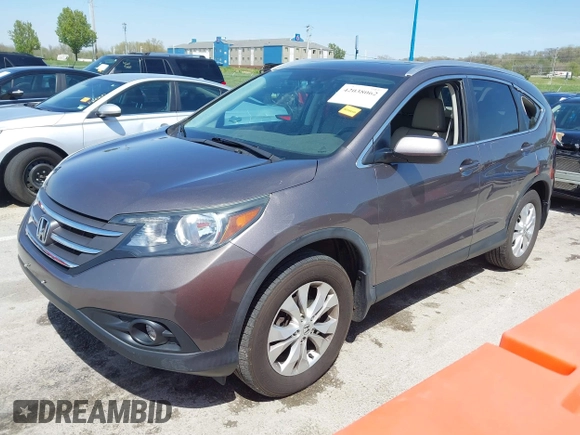 2014 Honda CR-V EX-L with VIN 5J6RM4H70EL096555, listed as a IAAI auction lot 42038062 with 113,601 mi miles. Bid and sale history available at carsss.com. Image 2.