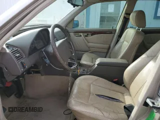 1997 Mercedes-Benz C z VIN WDBHA23EXVF601373, wystawiony jako Copart lot #78402194 z przebiegiem 187 821 mil mil oraz Szkoda całkowita • Salvage title. Historia ofert i sprzedaży dostępna na DreamBid. Obrazek 7.