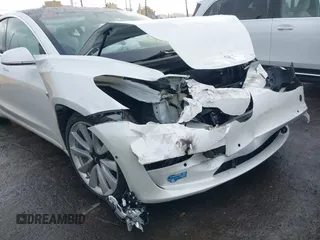 2020 Tesla Model 3 Standard Range Plus with VIN 5YJ3E1EA0LF741311, listed as a IAAI auction lot 41581931 with 43,284 mi miles. Bid and sale history available at carsss.com. Image 19.