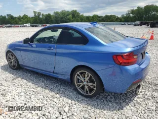 2015 BMW 2 Series M235i xDrive with VIN WBA1J9C57FVX99068, listed as a Copart auction lot 58204484 with 127,706 mi miles. Bid and sale history available at carsss.com. Image 2.