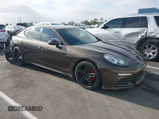 2014 Porsche Panamera S with VIN WP0AB2A75EL056107, listed as a IAAI auction lot 42619685 with 143,574 mi miles and . Bid and sale history available at DreamBid. Image 1.