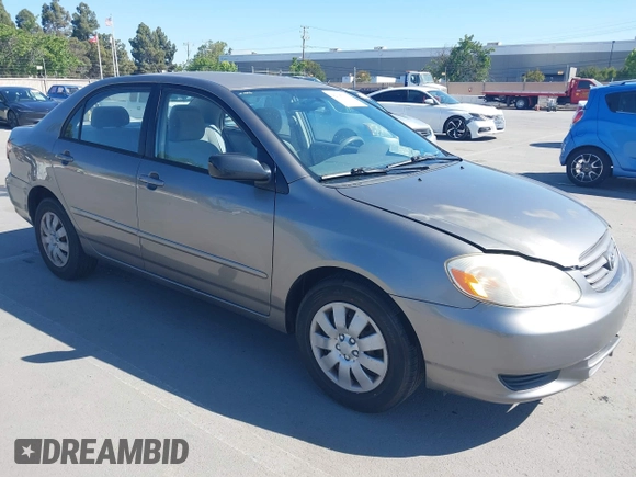 2004 Toyota Corolla CE with VIN 1NXBR32E64Z303089, listed as a IAAI auction lot 42147550 with 232,062 mi miles. Bid and sale history available at carsss.com. Image 1.