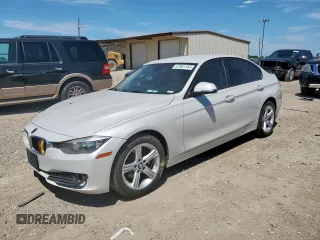2015 BMW 3 Series 320i with VIN WBA3B1C5XFP831703, listed as a Copart auction lot 57561155 with 135,034 mi miles and Salvage title. Bid and sale history available at DreamBid. Image 1.