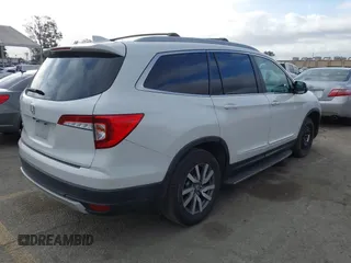 2020 Honda Pilot EX-L with VIN 5FNYF5H57LB003059, listed as a IAAI auction lot 41685916 with 114,742 mi miles. Bid and sale history available at carsss.com. Image 4.