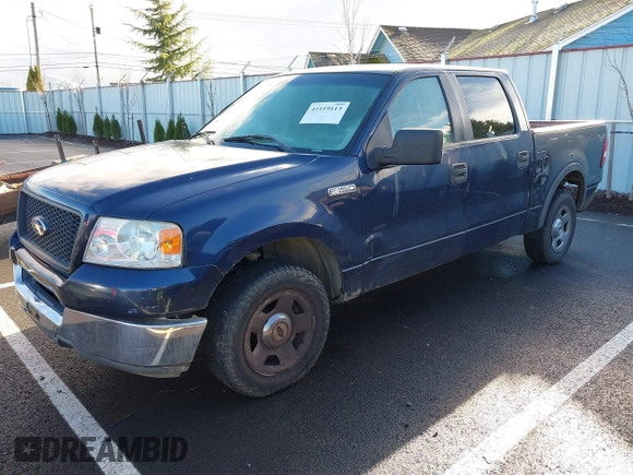2005 Ford F-150 XLT with VIN 1FTRW12W25KB58736, listed as a IAAI auction lot 41119113 with 218,797 mi miles. Bid and sale history available at carsss.com. Image 2.