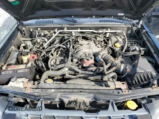 2004 Nissan Xterra XE z VIN 5N1ED28YX4C645187, wystawiony jako Copart lot #58788215 z przebiegiem 168 720 mil mil oraz Czysty tytuł • Clean title. Historia ofert i sprzedaży dostępna na DreamBid. Obrazek 12.