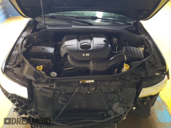 2015 Jeep Grand Cherokee Overland with VIN 1C4RJFCG8FC653117, listed as a Copart auction lot 49254595 with 142,359 mi miles and Clean Title. Bid and sale history available at carsss.com. Image 12.