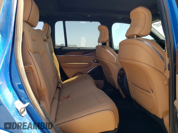2023 Jeep Grand Cherokee Summit Reserve with VIN 1C4RJYE60P8881133, listed as a Copart auction lot 52354915 with 31,739 mi miles and Salvage title. Bid and sale history available at DreamBid. Image 12.