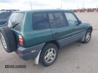 1998 Toyota RAV4 with VIN JT3GP10V5W0026814, listed as a IAAI auction lot 42003456 with 196,842 mi miles and . Bid and sale history available at DreamBid. Image 4.