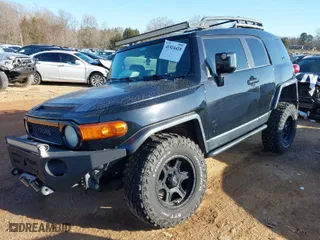 2008 Toyota FJ Cruiser with VIN JTEBU11F78K012714, listed as a IAAI auction lot 41524428 with 209,130 mi miles. Bid and sale history available at carsss.com. Image 2.
