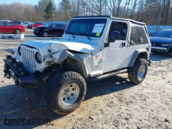 2005 Jeep Wrangler Unlimited with VIN 1J4FA44SX5P316055, listed as a IAAI auction lot 41586898 with 218,181 mi miles. Bid and sale history available at carsss.com. Image 2.