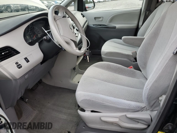 2012 Toyota Sienna with VIN 5TDKA3DC0CS014719, listed as a Copart auction lot 88358865 with 118,901 mi miles and Salvage Title. Bid and sale history available at DreamBid. Image 7.