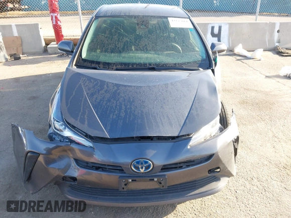 2022 Toyota Prius L Eco with VIN JTDKAMFUXN3188930, listed as a IAAI auction lot 42275661 with 116,934 mi miles and . Bid and sale history available at DreamBid. Image 12.