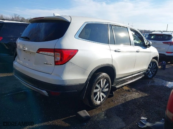 2021 Honda Pilot EX-L with VIN 5FNYF6H54MB020232, listed as a IAAI auction lot 41416780 with 99,667 mi miles. Bid and sale history available at carsss.com. Image 4.