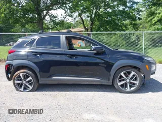 2020 Hyundai Kona Limited z VIN KM8K33A52LU591422, wystawiony jako IAAI lot #42324828 z przebiegiem 59 957 mil mil oraz . Historia ofert i sprzedaży dostępna na DreamBid. Obrazek 13.