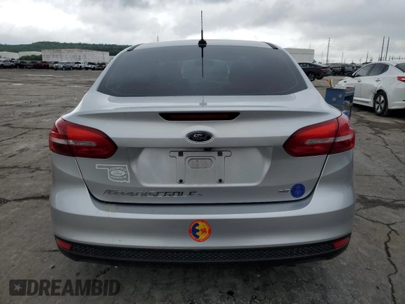 2017 Ford Focus SE z VIN 1FADP3F28HL270925, wystawiony jako Copart lot #56149505 z przebiegiem 27 544 mil mil oraz Szkoda całkowita • Salvage title. Historia ofert i sprzedaży dostępna na DreamBid. Obrazek 6.