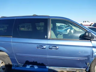 2007 Dodge Grand Caravan SXT with VIN 2D4GP44LX7R313906, listed as a IAAI auction lot 41402653 with 82,315 mi miles and . Bid and sale history available at DreamBid. Image 13.