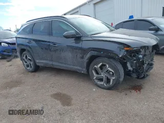 2023 Hyundai Tucson SEL z VIN 5NMJFCAE4PH290915, wystawiony jako IAAI lot #41426737 z przebiegiem 13 113 mil mil oraz . Historia ofert i sprzedaży dostępna na DreamBid. Obrazek 1.