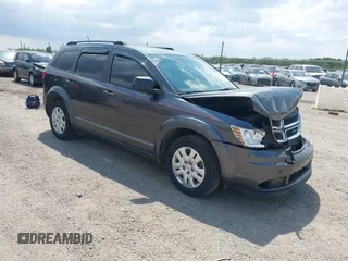 2017 Dodge Journey SE z VIN 3C4PDCAB5HT673336, wystawiony jako IAAI lot #42220638 z przebiegiem 115 434 mil mil oraz . Historia ofert i sprzedaży dostępna na DreamBid. Obrazek 1.