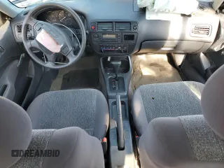 1998 Honda Civic CX with VIN 2HGEJ6427WH121499, listed as a Copart auction lot 73657704 with 101,999 mi miles and Salvage Title. Bid and sale history available at DreamBid. Image 8.