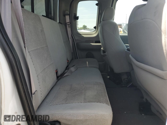 2003 Ford F-150 XL with VIN 2FTRX17L23CA17128, listed as a Copart auction lot 60144965 with 121,055 mi miles and Salvage title. Bid and sale history available at DreamBid. Image 10.