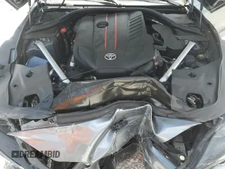 2021 Toyota Supra 3.0 z VIN WZ1DB0C06MW041275, wystawiony jako Copart lot #46954384 z przebiegiem Nie podano mil oraz . Historia ofert i sprzedaży dostępna na DreamBid. Obrazek 11.