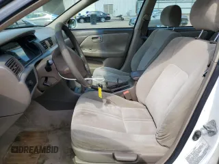 2001 Toyota Camry CE z VIN 4T1BG22K11U848960, wystawiony jako Copart lot #57259655 z przebiegiem 219 477 mil mil oraz Szkoda całkowita • Salvage title. Historia ofert i sprzedaży dostępna na DreamBid. Obrazek 7.