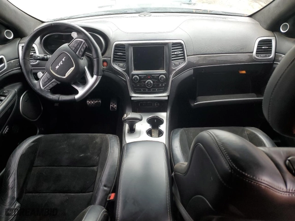 2015 Jeep Grand Cherokee SRT with VIN 1C4RJFDJ8FC752210, listed as a Copart auction lot 45694094 with 76,721 mi miles and Salvage Title. Bid and sale history available at carsss.com. Image 8.