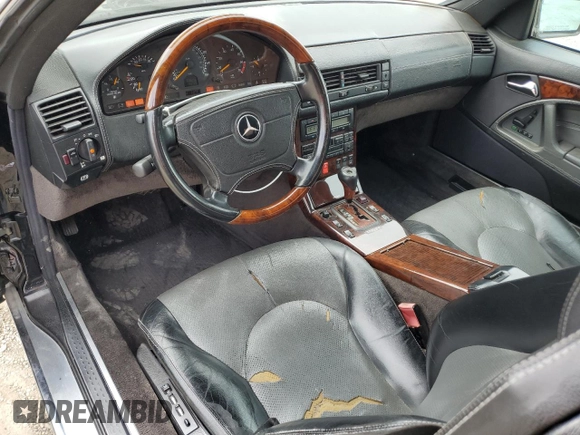 1998 Mercedes-Benz SL z VIN WDBFA76F6WF165874, wystawiony jako Copart lot #53392195 z przebiegiem 141 126 mil mil oraz Tytuł czysty. Historia ofert i sprzedaży dostępna na DreamBid. Obrazek 8.