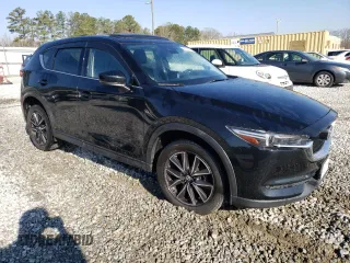 2017 Mazda CX-5 Grand Touring with VIN JM3KFBDL4H0209770, listed as a Copart auction lot 48181935 with 39,128 mi miles and Salvage Title. Bid and sale history available at carsss.com. Image 4.