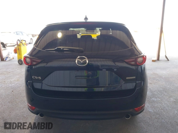 2020 Mazda CX-5 Touring z VIN JM3KFACM2L0802461, wystawiony jako IAAI lot #42148039 z przebiegiem 57 963 mil mil oraz . Historia ofert i sprzedaży dostępna na DreamBid. Obrazek 17.