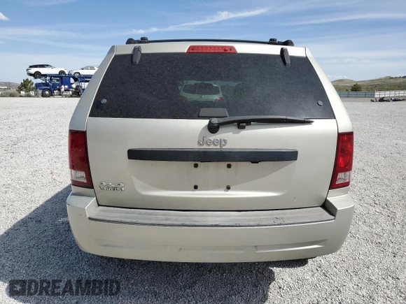 2007 Jeep Grand Cherokee Laredo z VIN 1J8GR48K17C596514, wystawiony jako Copart lot #54404755 z przebiegiem 230 033 mil mil oraz Szkoda całkowita • Salvage title. Historia ofert i sprzedaży dostępna na DreamBid. Obrazek 6.