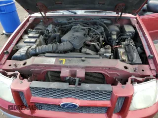 2003 Ford Explorer Sport XLS z VIN 1FMZU70E93UC11352, wystawiony jako Copart lot #84494984 z przebiegiem 188 874 mil mil oraz Szkoda całkowita • Salvage title. Historia ofert i sprzedaży dostępna na DreamBid. Obrazek 11.