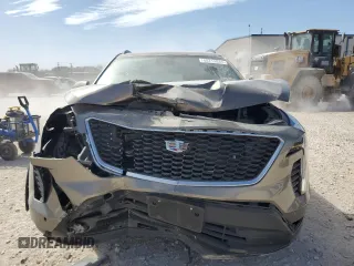 2020 Cadillac XT4 FWD Sport z VIN 1GYFZER40LF134537, wystawiony jako Copart lot #48219045 z przebiegiem 77 307 mil mil oraz Szkoda całkowita • Salvage title. Historia ofert i sprzedaży dostępna na DreamBid. Obrazek 5.