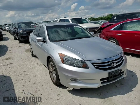 2011 Honda Accord EX-L z VIN 1HGCP3F8XBA018477, wystawiony jako Copart lot #58626995 z przebiegiem 74 108 mil mil oraz Szkoda całkowita • Salvage title. Historia ofert i sprzedaży dostępna na DreamBid. Obrazek 13.