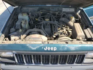 1996 Jeep Cherokee Sport with VIN 1J4FJ68S3TL257912, listed as a Copart auction lot 77109634 with 53,841 mi miles and Clean Title. Bid and sale history available at carsss.com. Image 12.