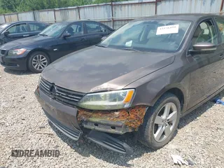 2012 Volkswagen Jetta TDI z VIN 3VWLL7AJ3CM349740, wystawiony jako IAAI lot #42576459 z przebiegiem 135 444 mil mil oraz . Historia ofert i sprzedaży dostępna na DreamBid. Obrazek 6.