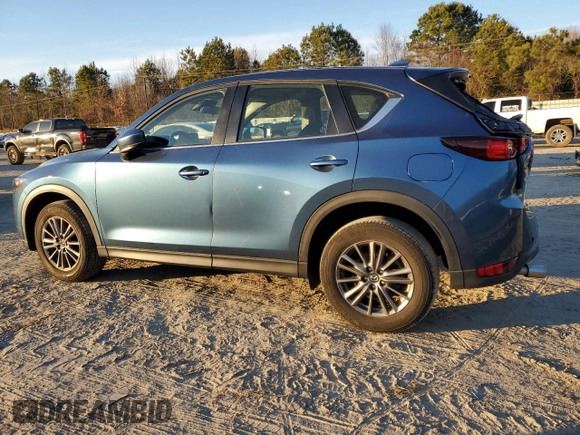 2021 Mazda CX-5 Sport with VIN JM3KFABMXM1313156, listed as a Copart auction lot 41365285 with 42,828 mi miles and Salvage Title. Bid and sale history available at carsss.com. Image 2.