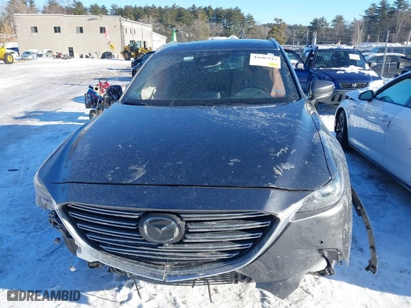 2019 Mazda CX-9 Signature with VIN JM3TCBEY1K0323238, listed as a IAAI auction lot 41607913 with 101,136 mi miles. Bid and sale history available at carsss.com. Image 12.
