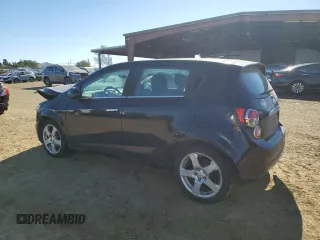 2012 Chevrolet Sonic LTZ z VIN 1G1JE6SH5C4195594, wystawiony jako Copart lot #88336435 z przebiegiem 105 112 mil mil oraz Szkoda całkowita • Salvage title. Historia ofert i sprzedaży dostępna na DreamBid. Obrazek 2.