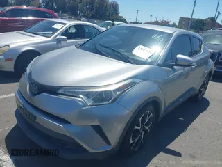 2018 Toyota C-HR XLE z VIN NMTKHMBX2JR057798, wystawiony jako IAAI lot #42327724 z przebiegiem 115 715 mil mil oraz . Historia ofert i sprzedaży dostępna na DreamBid. Obrazek 16.