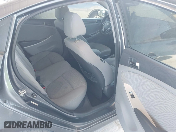 2012 Hyundai Accent GLS with VIN KMHCU4AE5CU246327, listed as a IAAI auction lot 42124657 with 139,287 mi miles. Bid and sale history available at carsss.com. Image 8.