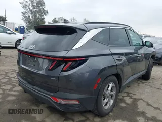 2023 Hyundai Tucson SEL z VIN KM8JBCAE9PU242486, wystawiony jako IAAI lot #41860406 z przebiegiem 25 294 mil mil oraz . Historia ofert i sprzedaży dostępna na DreamBid. Obrazek 4.