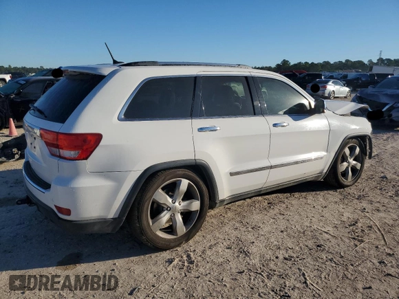 2013 Jeep Grand Cherokee Overland with VIN 1C4RJFCG8DC606862, listed as a Copart auction lot 82149804 with 155,999 mi miles and Salvage Title. Bid and sale history available at carsss.com. Image 3.