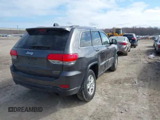 2015 Jeep Grand Cherokee Laredo with VIN 1C4RJFAG6FC140581, listed as a IAAI auction lot 41869952 with 193,295 mi miles. Bid and sale history available at carsss.com. Image 4.