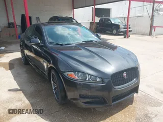 2015 Jaguar XF V6 Portfolio with VIN SAJWA0F74F8U76324, listed as a IAAI auction lot 41462979 with 136,959 mi miles. Bid and sale history available at carsss.com. Image 1.