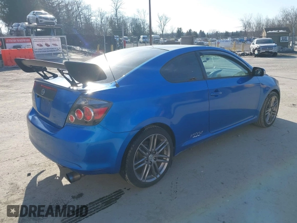 2010 Scion tC with VIN JTKDE3B78A0315248, listed as a IAAI auction lot 41442648 with 125,037 mi miles. Bid and sale history available at carsss.com. Image 4.