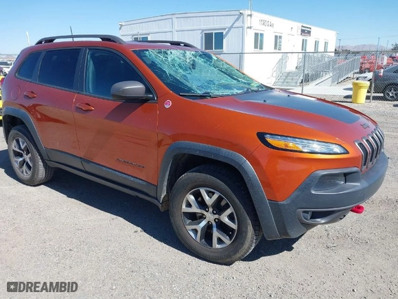 2016 Jeep Cherokee Trailhawk with VIN 1C4PJMBS8GW176464, listed as a IAAI auction lot 41656518 with 63,724 mi miles. Bid and sale history available at carsss.com. Image 1.