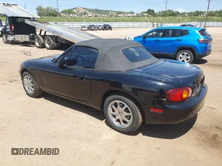 1999 Mazda MX-5 Miata with VIN JM1NB3535X0119662, listed as a Copart auction lot 61870445 with 84,787 mi miles and Clean title. Bid and sale history available at DreamBid. Image 2.